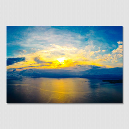 Epic sunrise of the gods over a calm Pacific Ocean near Coiba Island, Panama