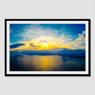 Epic sunrise of the gods over a calm Pacific Ocean near Coiba Island, Panama