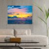 Distant schooner ship with colorful spectrum sky and cloud formations